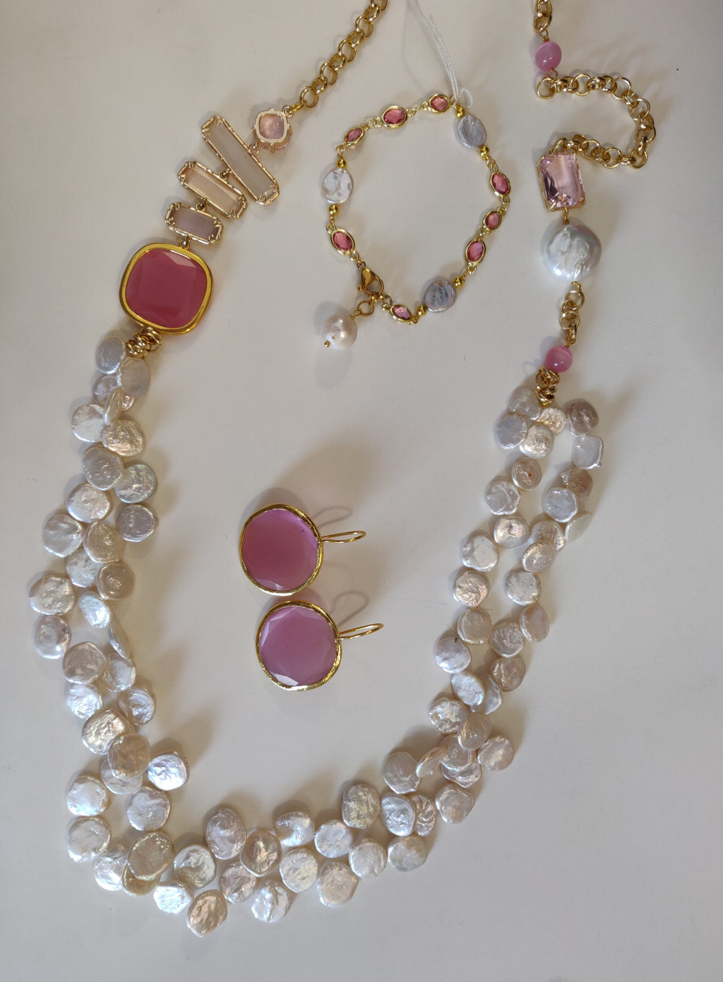 Set of necklace, earrings and bracelet