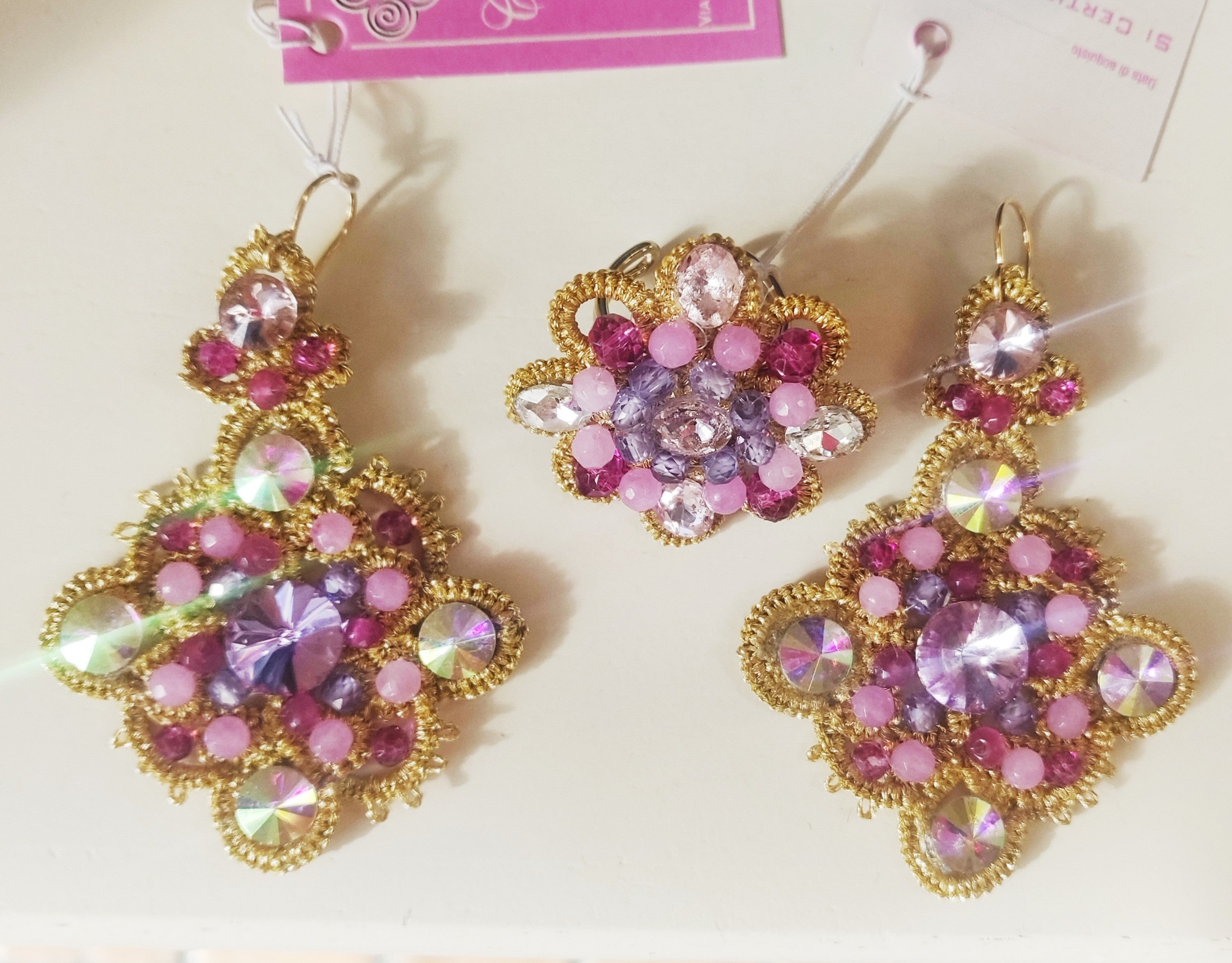 Set of earrings and ring