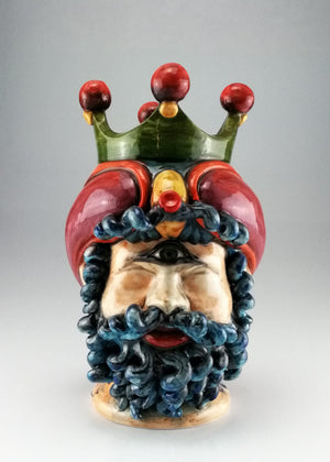 Testa di Polifemo con corona e barba blu
