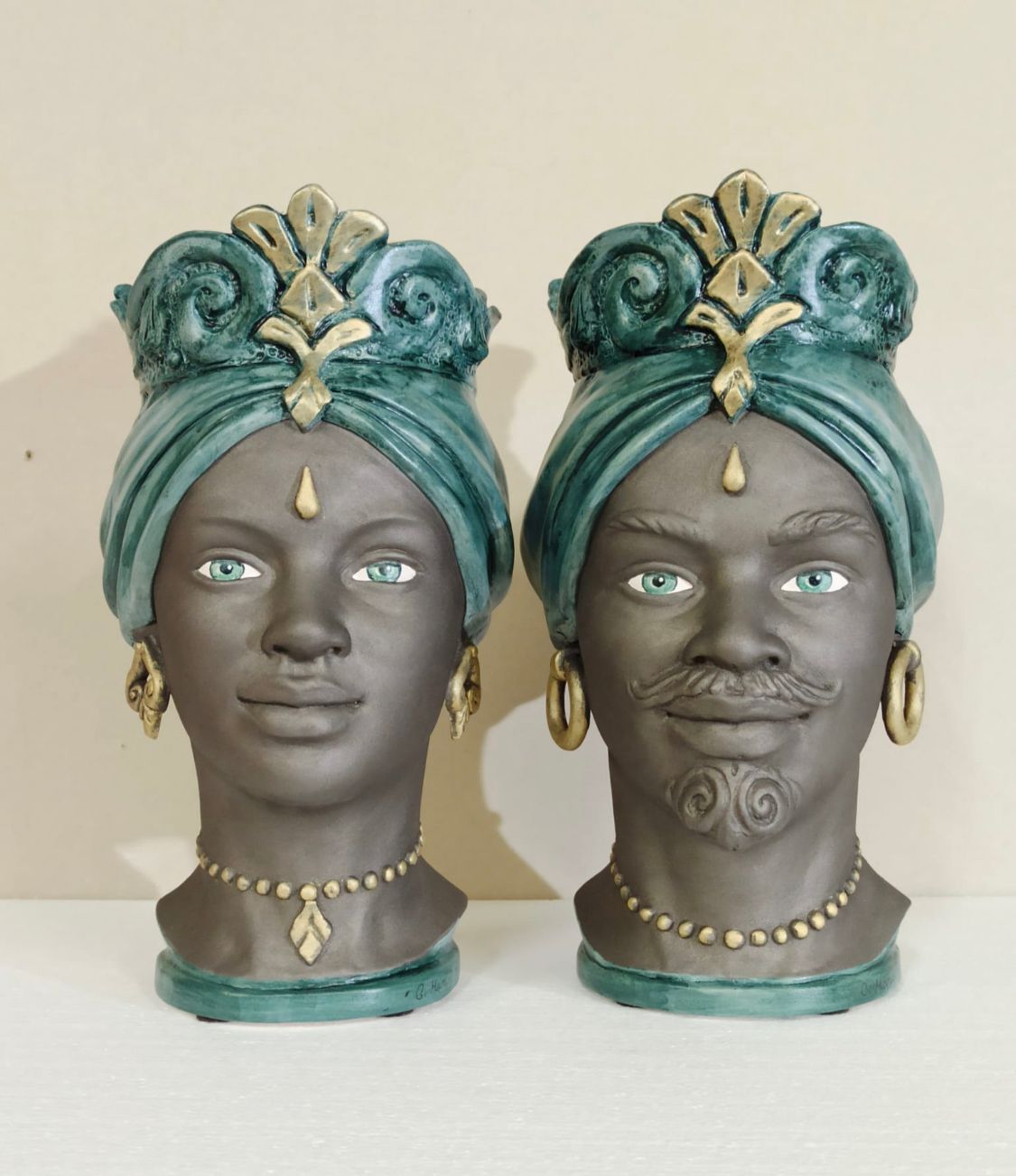 Pair of Moro's Heads with turquoise blue turban
