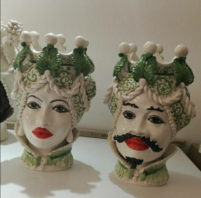 Pair of Heads of Moro with green decoration