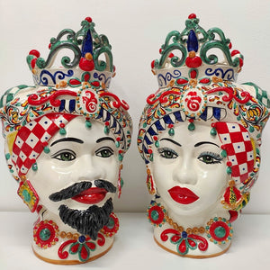 Pair of Moor's Heads with chess decoration