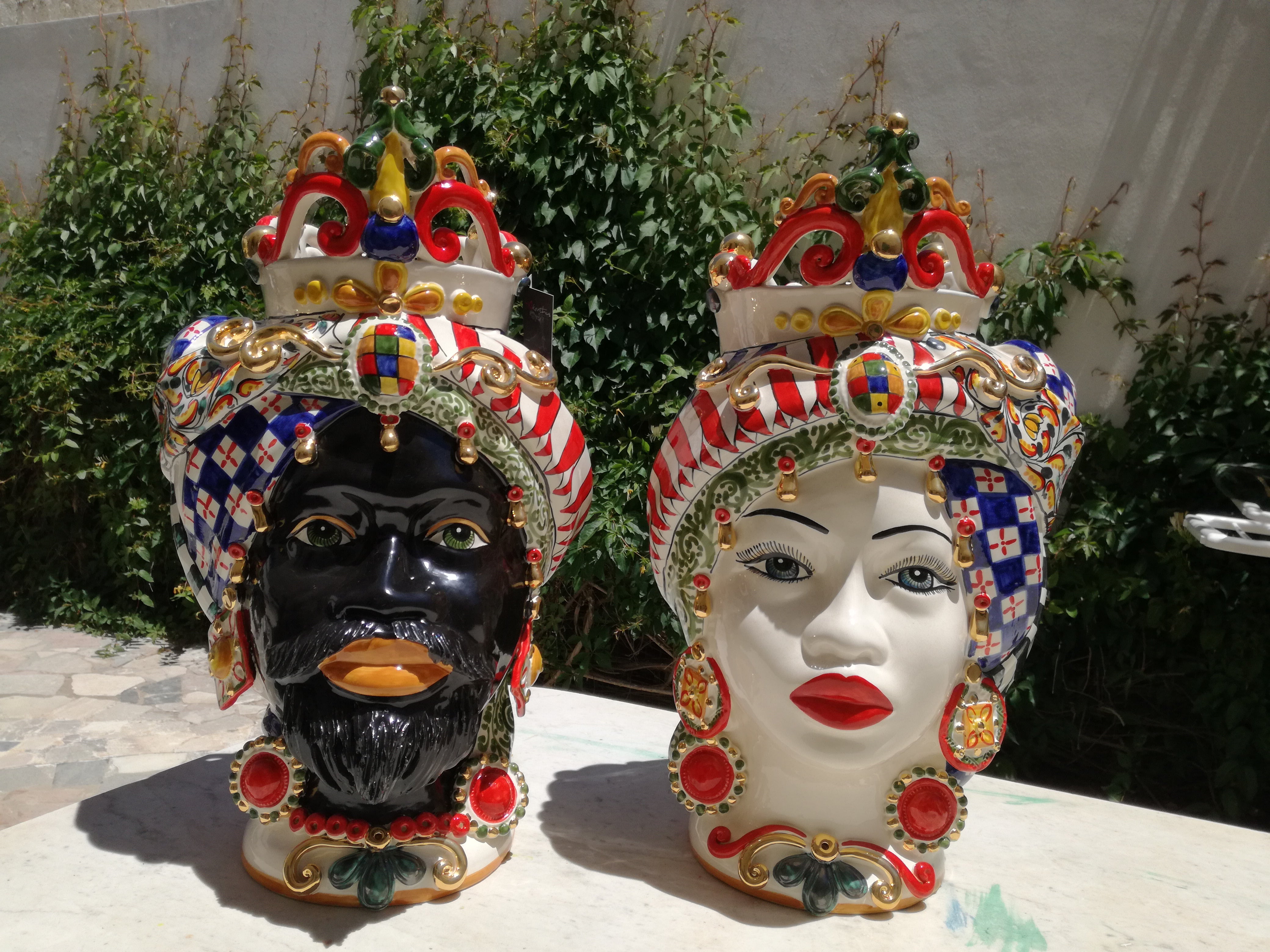 Pair of Moor's Heads with chess and pure gold