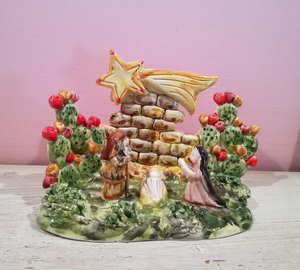 Ceramic nativity scene with prickly pears and comet