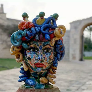Medusa head with mosaic effect face