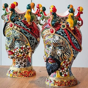 Pair of Moorish heads with multicolored decoration
