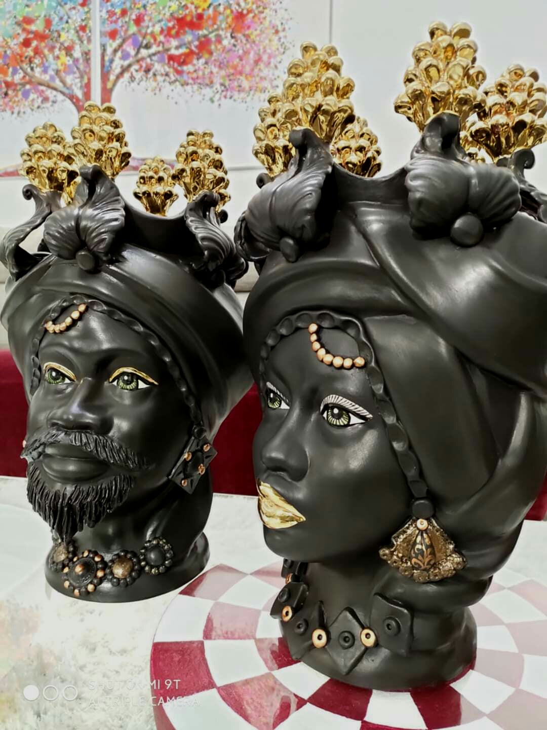 Pair of black Moor's heads and pure gold
